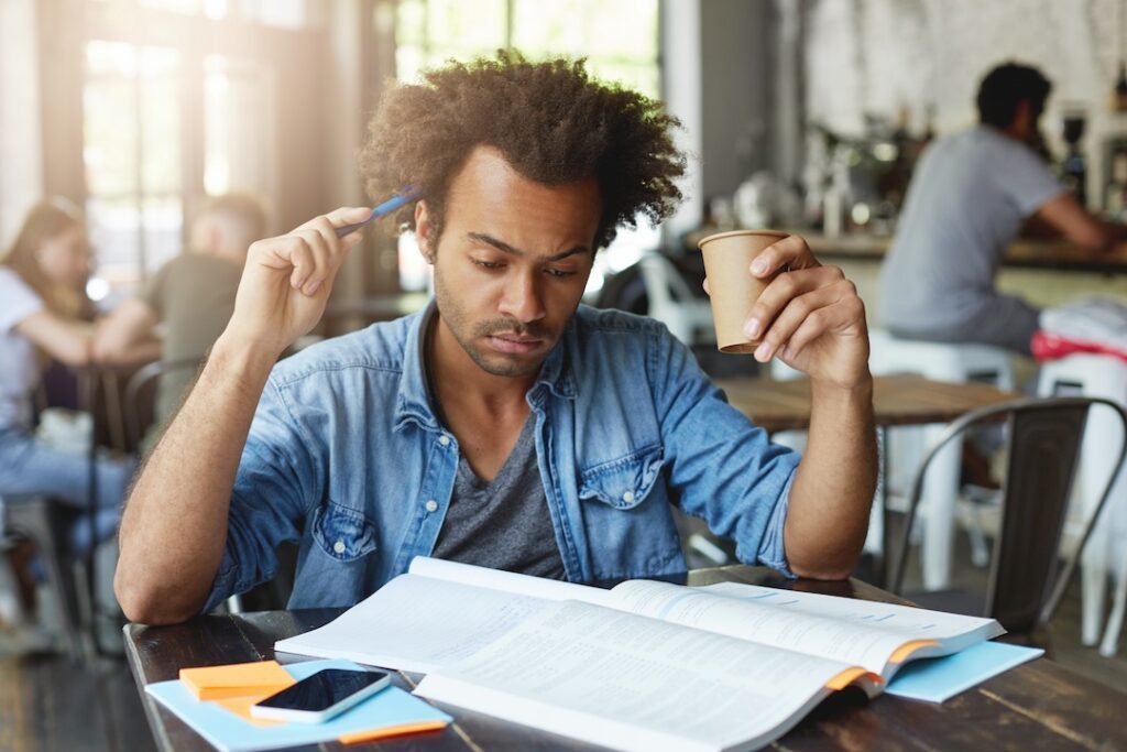 Student focused on his revisions